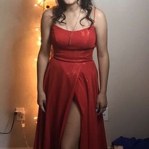 Prom dress only worn once. Corset back. Red and shiny.